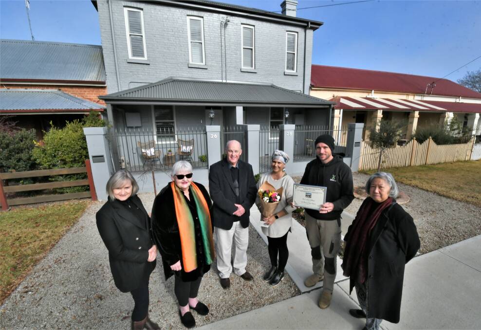 SAVED: Robin White, Di Barnes, Richard Steele, Amy and Damian Fulthorpe, and Ingrid Pearson at 26-28 Morrisset Street. Photo: CHRIS SEABROOK 052521chouse