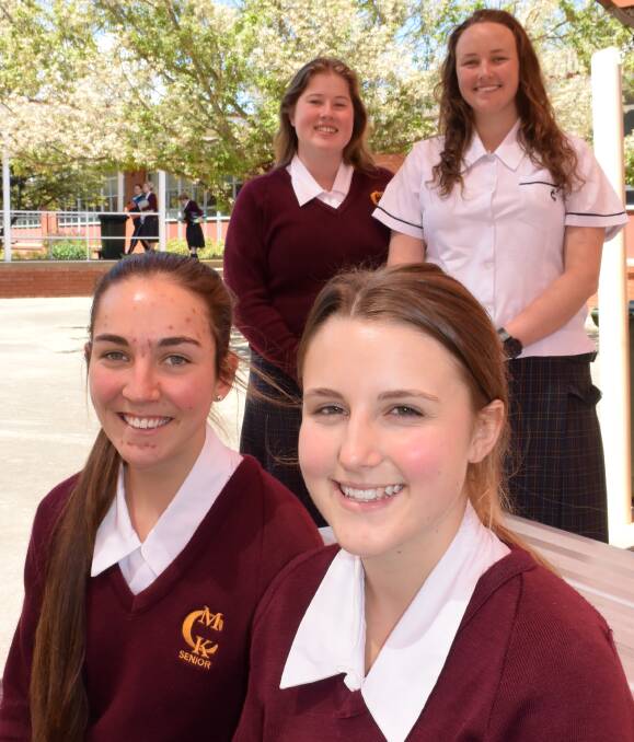 FIRST ONE DOWN: MacKillop College Year 12 students (front) Carina Floyd, Abby Cawthorne, (back) Courtney Powell and Maddi Brown were feeling good after their first exam on Thursday. Photo: RACHEL FERRETT 101316rfhsc1