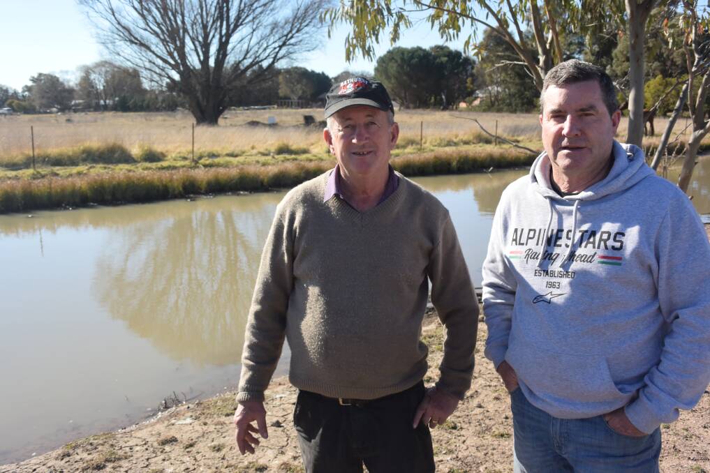 BEST SITE: Deputy mayor Bobby Bourke and councillor Warren Aubin at the Kelso floodplains, behind Paddy's Hotel.