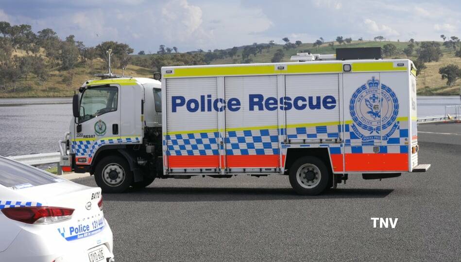 Police vehicles out at Chifley Dam on Saturday as the search began for the missing swimmer. Photo: TNV