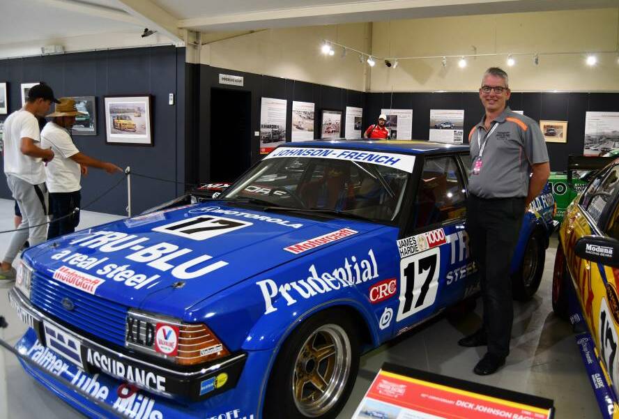 National Motor Racing Museum manager Brad Owen with the iconic Tru-Blu car driven by Dick Johnson.