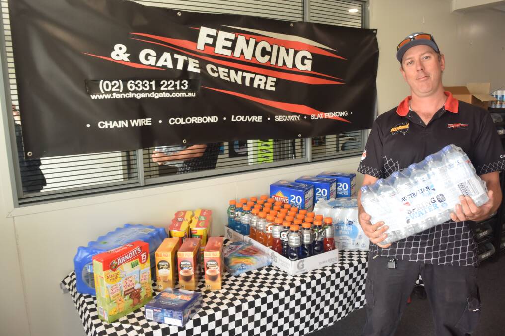 READY TO GO: Fencing and Gate Centre Bathurst manager Mitchell Finn with the donations he already has to take to volunteer firefighters on Sunday. Photo: RACHEL CHAMBERLAIN