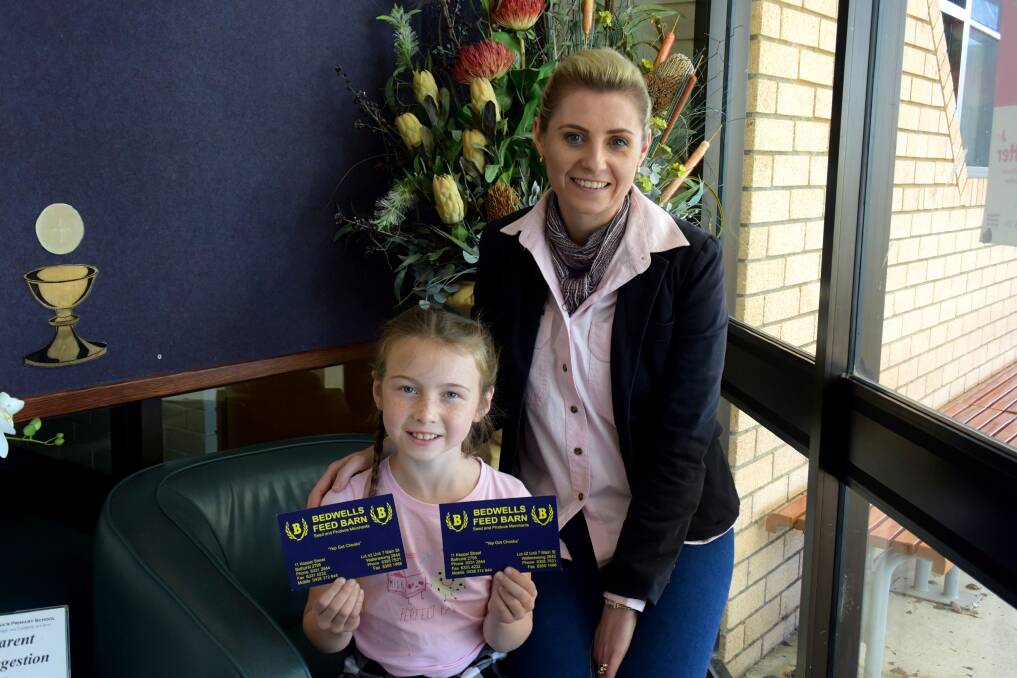 AMAZING GIFT: St Philomena's School student Ella-Grace Turnbull, pictured with principal Renae Dunleavy, donated her own awards to Rural Aid. Photo: RACHEL CHAMBERLAIN 081018rcspps2