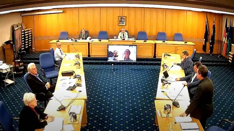 PROCESS: Councillors discussing the stimulus measures on Wednesday. 