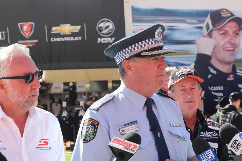 DELIVERING MESSAGE: Assistant Commissioner Geoff McKechnie, with Supercars chief operating officer Shane Howard and mayor Bobby Bourke. Photo: PHIL BLATCH