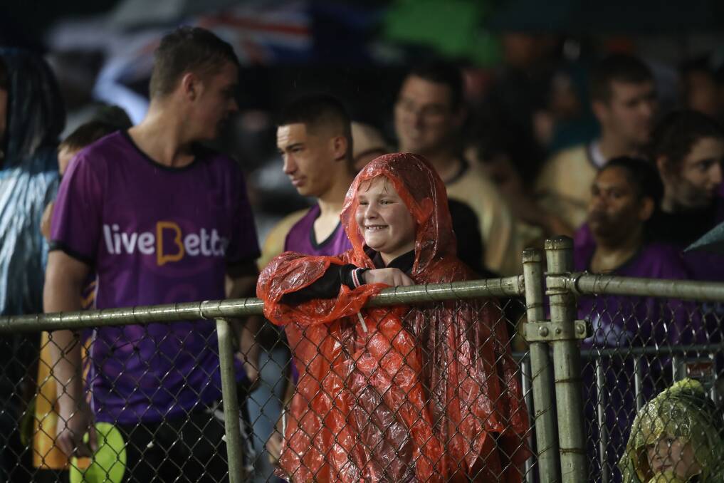 PHOTOS: Fans brave the rain at Carrington Park to see Wests Tigers win over Penrith Panthers
