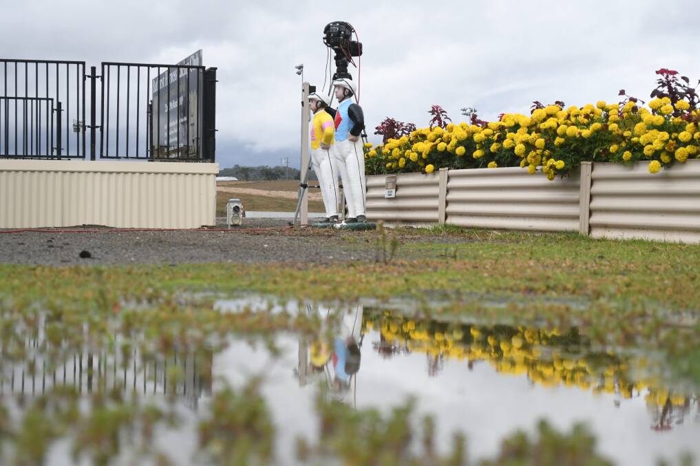 WET LOOK: Bathurst Harness Racing Club had a few puddles around on Monday afternoon following rain. Photo: CHRIS SEABROOK 032519cwet3