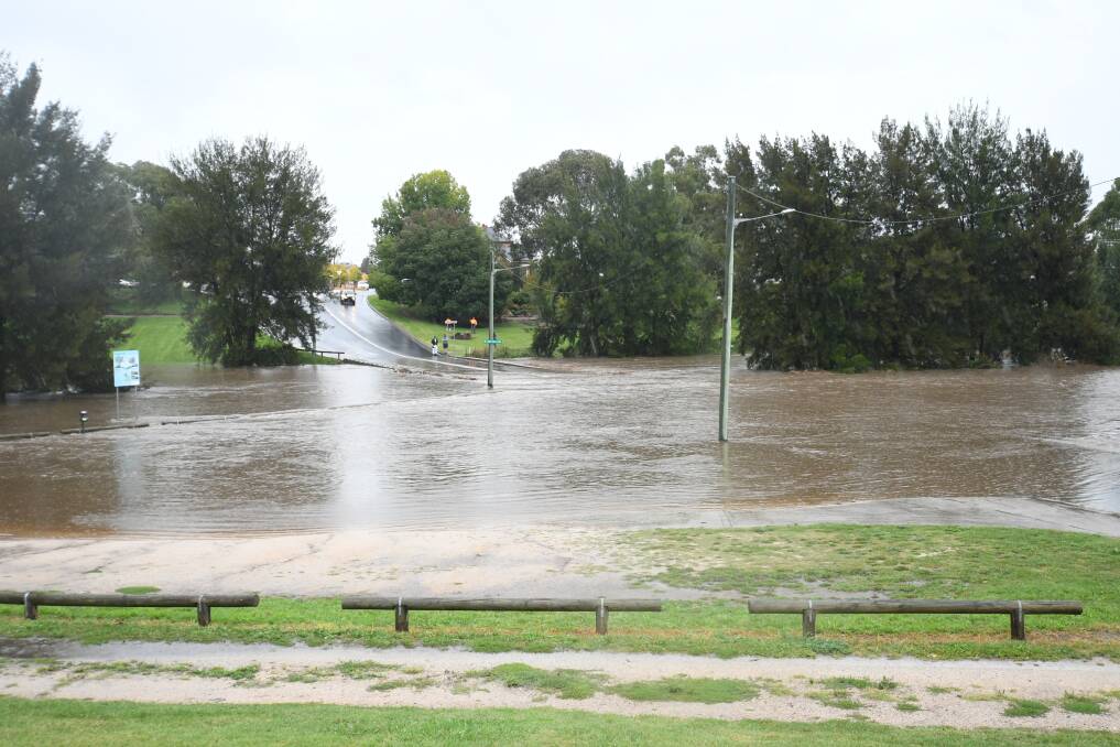 FLOODING: The Macquarie River peaked at 5.15 metres on Wednesday, but has now dropped enough to allow the low level bridge to reopen. 
