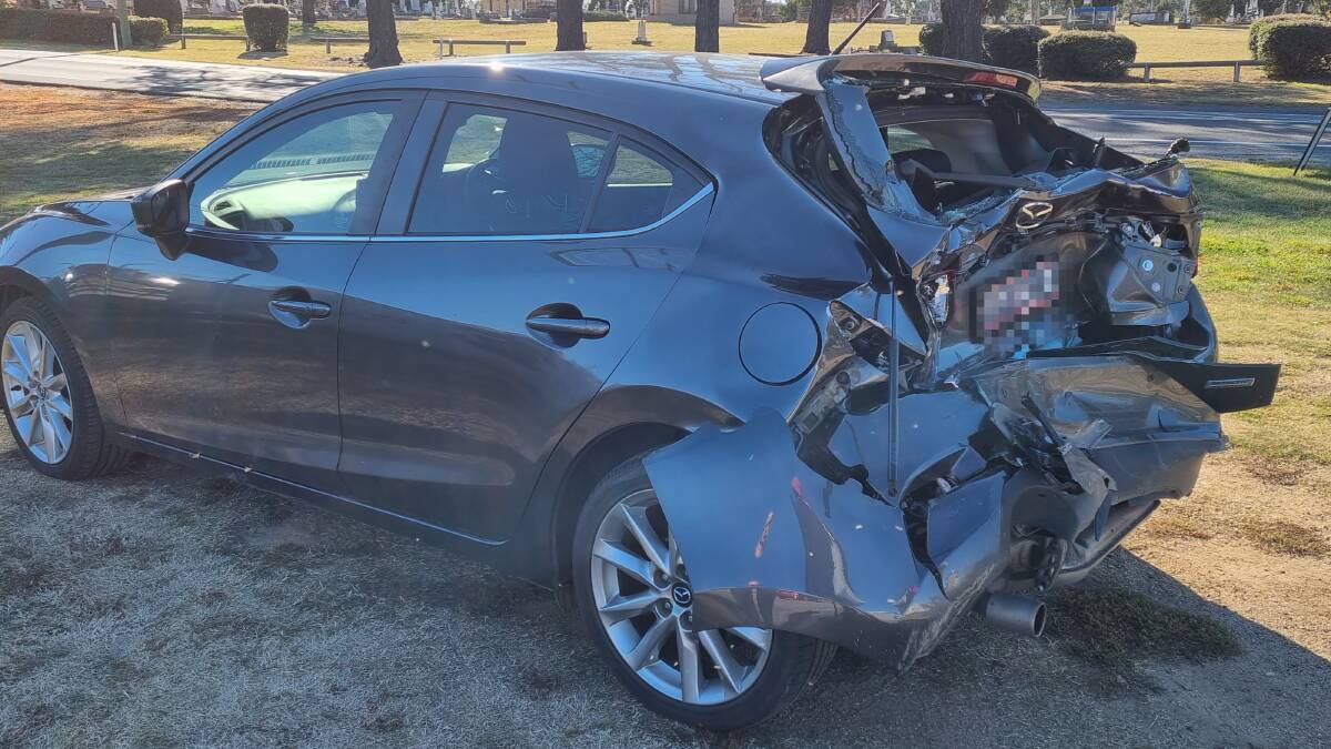 DAMAGE: This car copped a significant whack while waiting to turn into the Bathurst Golf Club. Photo: SUPPLIED