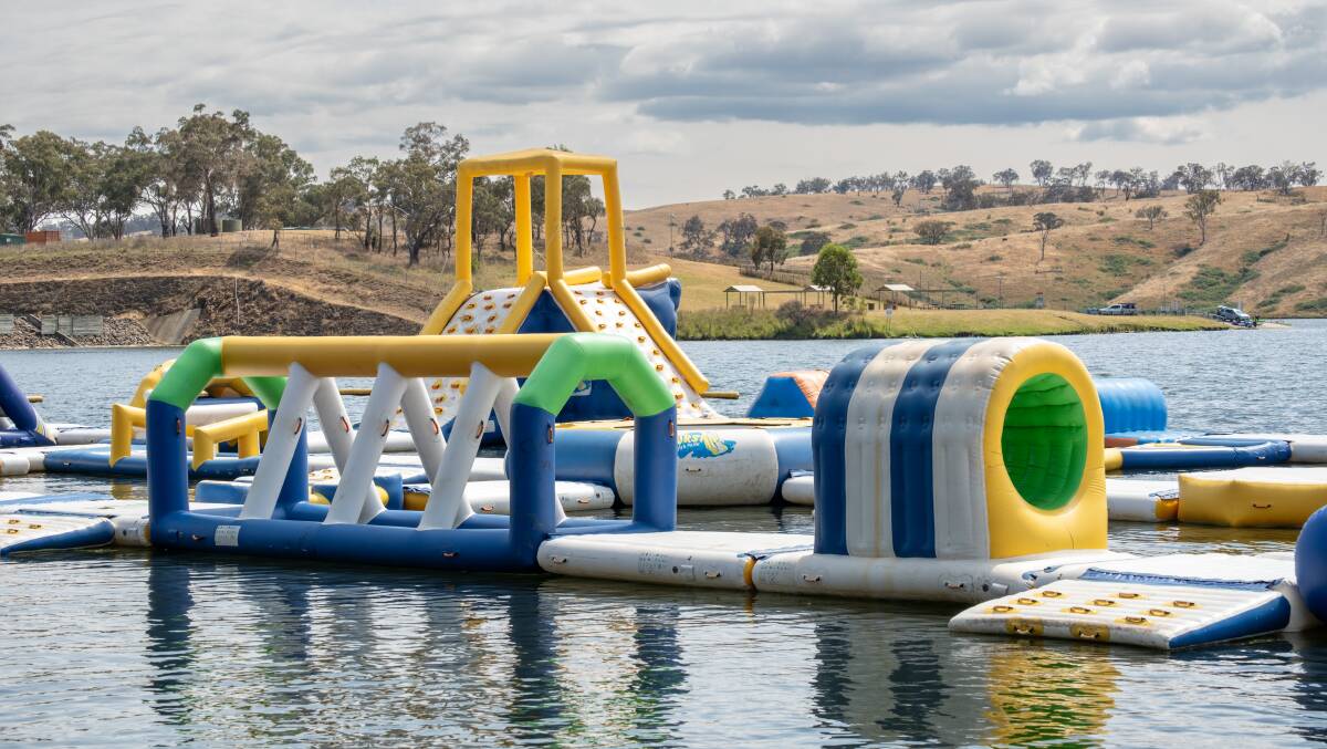 The Bathurst Aqua Park's inflatable equipment out on the water at Chifley Dam. Picture by James Arrow