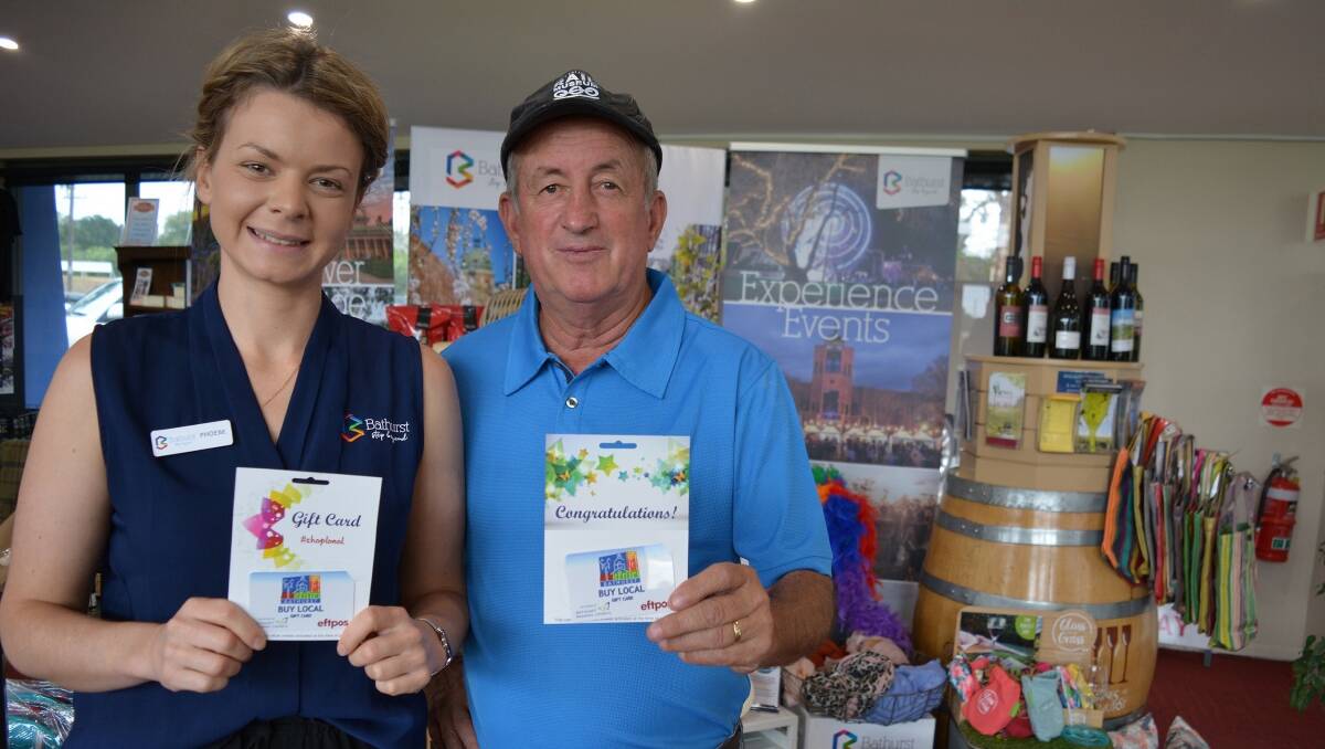SUCCESS: Tourism marketing co-ordinator Phoebe Rhodes and mayor Bobby Bourke at Bathurst Visitor Information Centre.