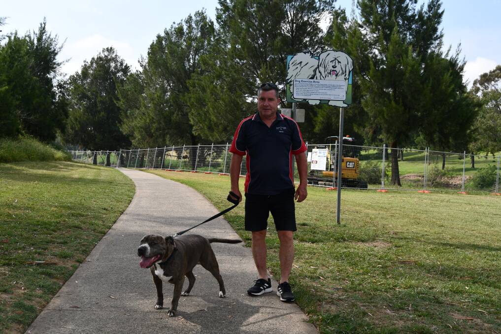 Councillor Warren Aubin pictured alongside the Macquarie River with his dog, Bentley. Picture by Rachel Chamberlain
