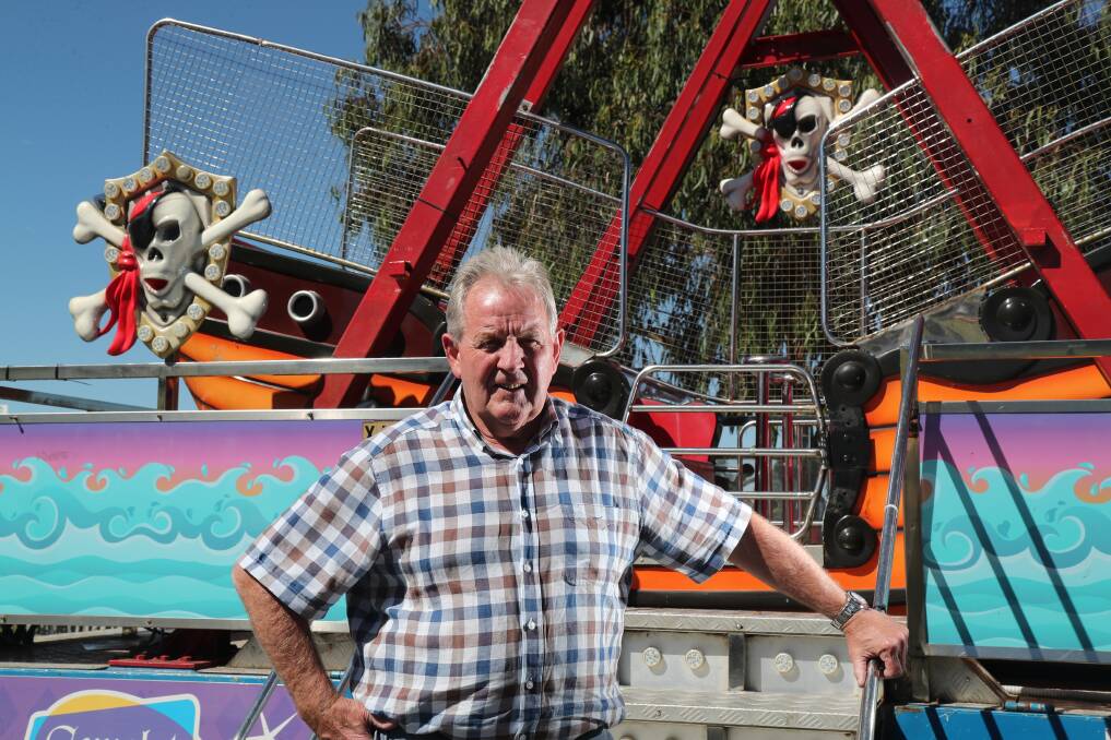 ATTRACTIONS: Mayor Robert Taylor down by the amusements at Party in the Park on New Year's Eve. Photo: PHIL BLATCH