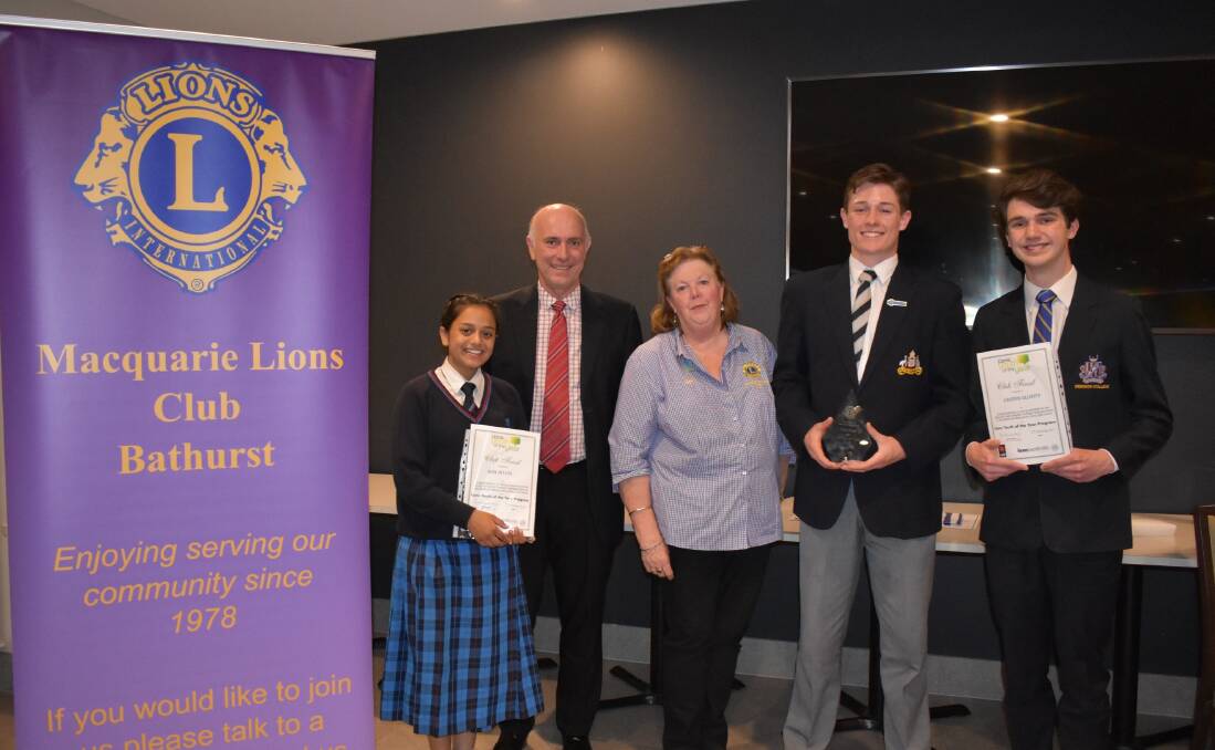STRONG COMPETITION: Competitors Simi Atluri, Jack Lynch and Griffin Elliott with judge Darren Channells and Macquarie Lions president Sue Longmore. Photo: SUPPLIED
