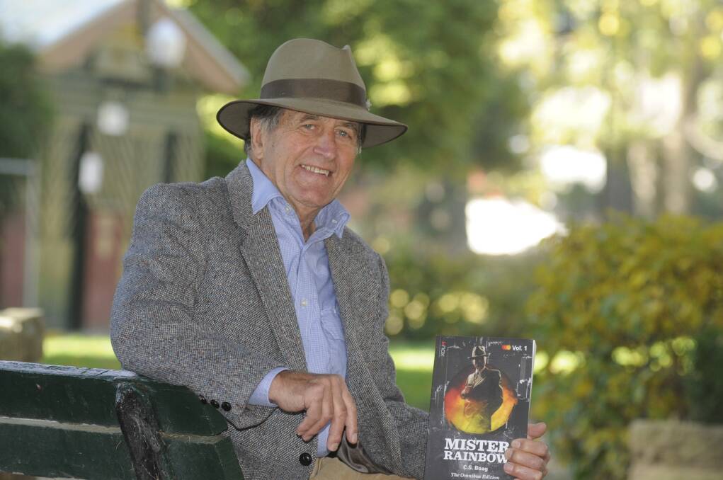 GREAT READ: Charles Boag with his book Mister Rainbow, which has just been republished in omnibus format. Photo: CHRIS SEABROOK 051717charles1