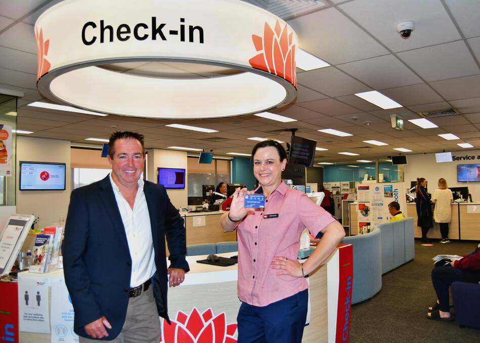 SUCCESS: Member for Bathurst Paul Toole with Michaela Hansen from the Bathurst branch of Service NSW, who is holding a Regional Seniors Travel Card. 