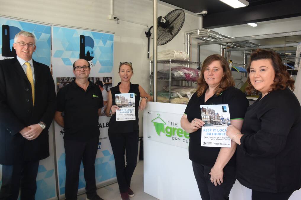 SUPPORT: Bathurst Business Chamber president Angus Edwards, with staff from the Green Dry Clean, launching the Keep it Local Bathurst campaign. Photo: RACHEL CHAMBERLAIN 091718rclocal2