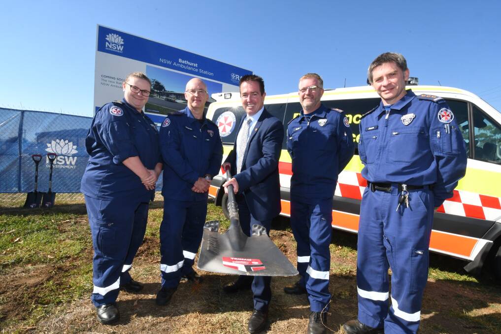 PROGRESS: Member for Bathurst Paul Toole with NSW Ambulance's Melanie Lawer, Stephen Burns, Superintendent Brad Porter and Jason Speight at the site of the new ambulance station. Photo: CHRIS SEABROOK 050718cambos6