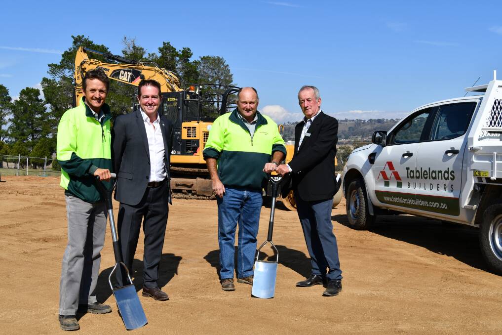ON SITE: Tablelands Builders director Robert Barlow and project manager Phil Hampton with Member for Bathurst Paul Toole and mayor Bobby Bourke at the site of the collections facility in Leena Street. Photo: RACHEL CHAMBERLAIN