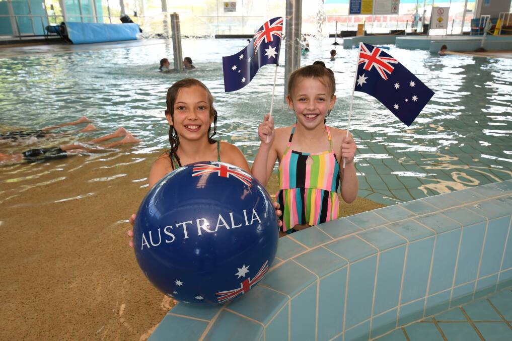 FUN: Lola Stafford, 10, and her friend Claire Taylor, 10, are ready to celebrate Australia Day. Photo: CHRIS SEABROOK 012120caustday3