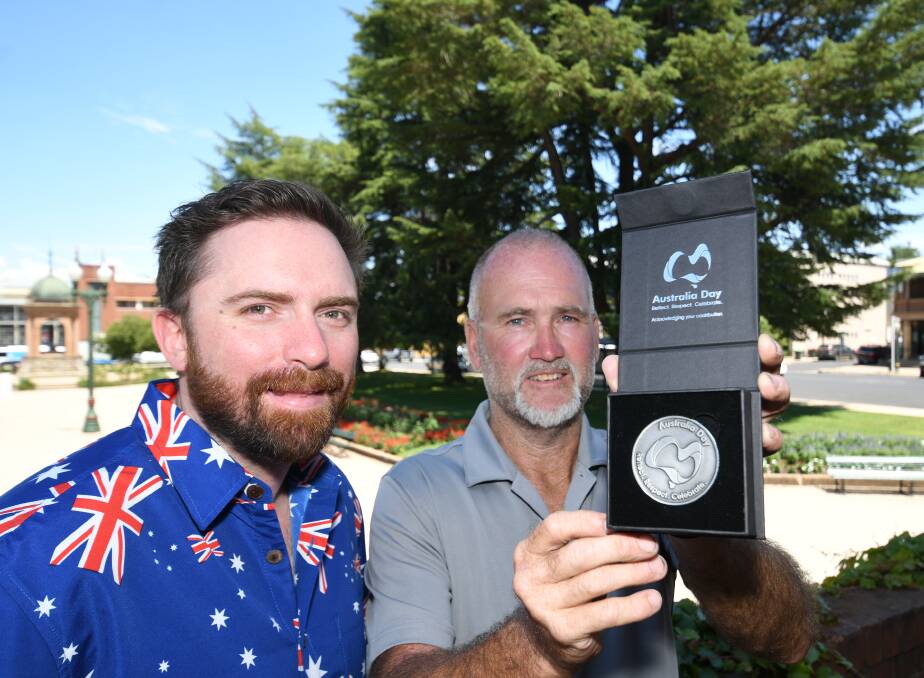 NEW AWARD: Councillor Alex Christian and deputy mayor Ian North with the Australia Day Achievement Medallion. Photo: CHRIS SEABROOK