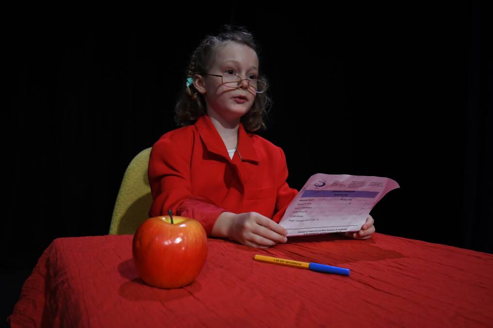 SNAPSHOT: Isabelle Ortiger, 7, playing Wendy the news reader at the BMEC workshop for aspiring actors. Photo: CHRIS SEABROOK 010819cbmec1