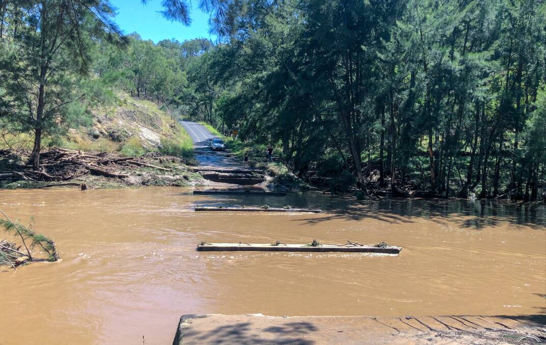 GONE: The timber deck of Howards Bridge was washed away after a storm on January 11. Photo: TANYA WILLEY