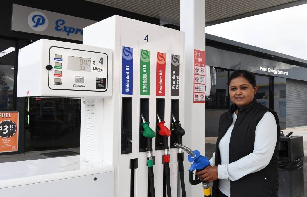 OPEN FOR BUSINESS: The manager of Pearl Energy Bathurst, Navwati, outside the newly-opened petrol station on the corner of William and Keppel streets. Photo: RACHEL CHAMBERLAIN 050120rcpearl1