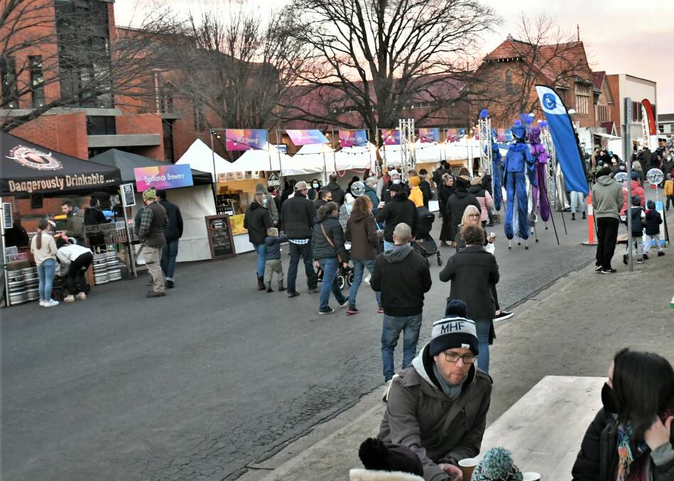 ATTRACTION: Food and drink vendors lined Church Street for Brew and Bite, a major event for the Bathurst Winter Festival. Photo: CHRIS SEABROOK 070321cwinfest3