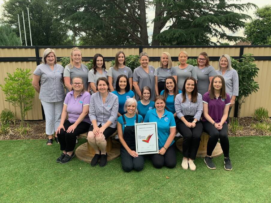 PROUD: The team at Goodstart Early Learning Bathurst with their award for achieving an 'Excellent' rating. Photo: SUPPLIED