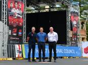 Legendary driver Craig Lowndes, mayor Jess Jennings and Supercars Chief Operating Officer Tim Watsford in Russell Street, where off-track activities will be held. Picture by Alexander Grant