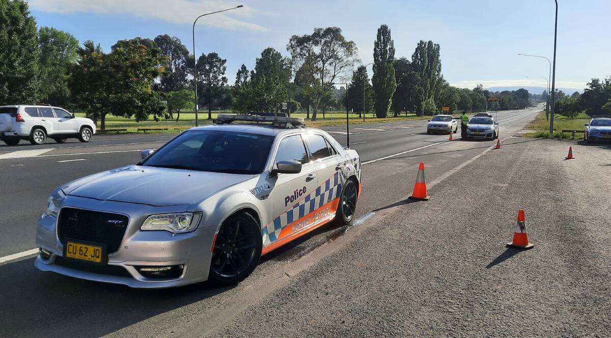 BREATH TESTING: Police preparing to stop vehicles on one of Bathurst's main roads. Photo: SUPPLIED