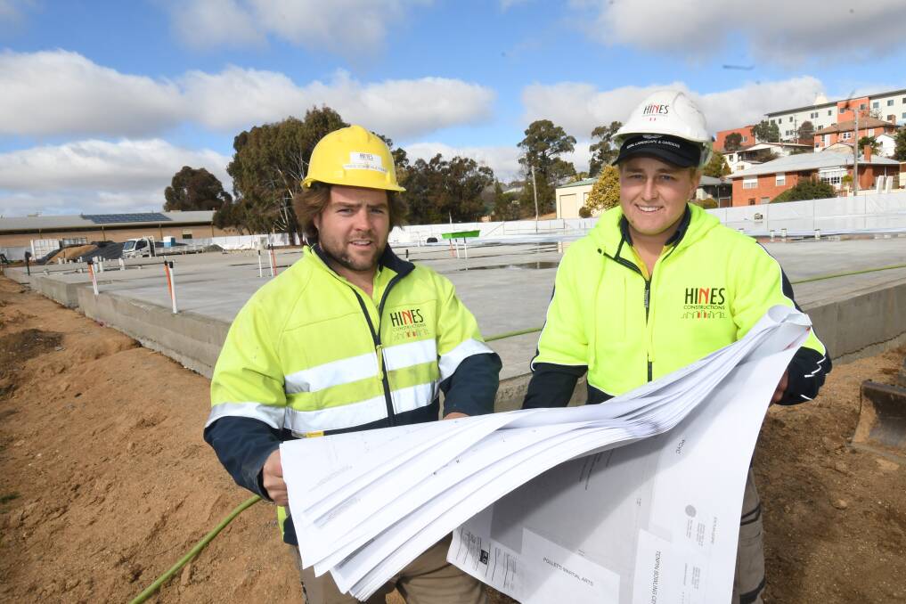 ON THE JOB: Hines Constructions site manager Mark Donnelly and foreman Jock Grant on site in Commonwealth Street, where the the new ambulance station is being built. Photo: CHRIS SEABROOK 073018cambos