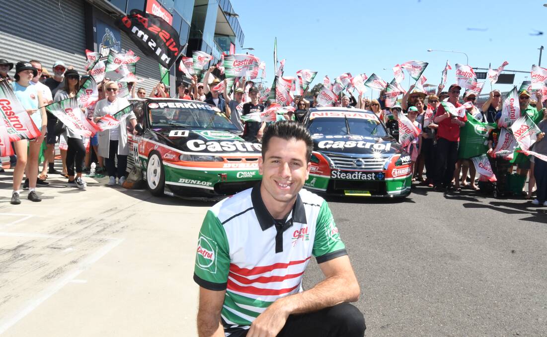 HOMAGE: Rick Kelly will use his livery to pay tribute to Larry Perkins at the Bathurst 1000. He showed off the design to fans on Tuesday. Photo: CHRIS SEABROOK 100218crkelly1