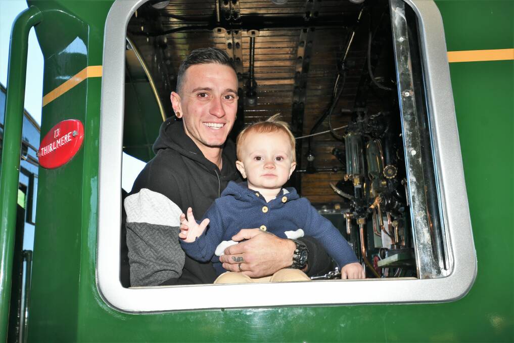 Tony and Keaton Gillbanks in the cab of the 3801. Photo: CHRIS SEABROOK