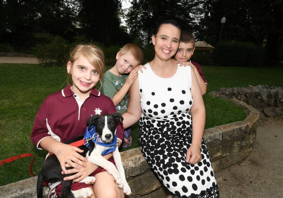 PRECIOUS PUP: Leanne Carter with children Faith, 8, Samuel, 4, Zechariah, 6, and their new puppy Charlotte. Photo: CHRIS SEABROOK 021820cpuppy
