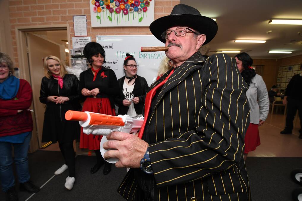 SHARP DRESSER: Peter Clark dressed as a gangster at the Seymour Centre's 39th birthday party on Wednesday. Photo: CHRIS SEABROOK 082218cseymr