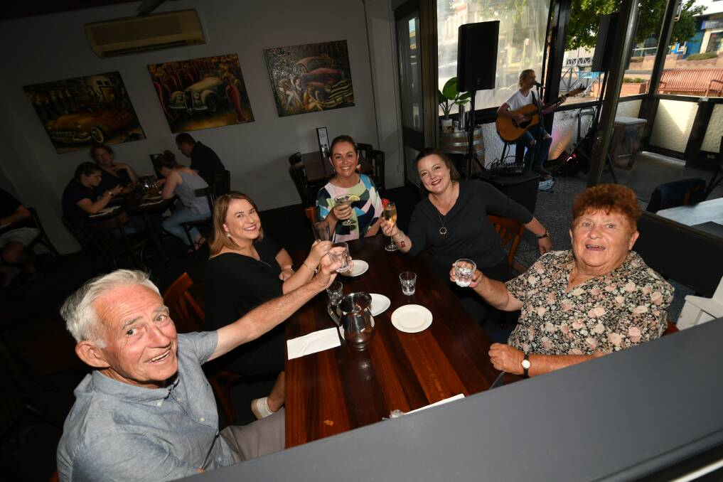CHEERS: Mick, Sharon and Sonya Sewell, owner of Pantano's Fiona Miller and Margaret Sewell enjoying New Year's Eve on Thursday night. Photo: CHRIS SEABROOK 123120cpantanos2