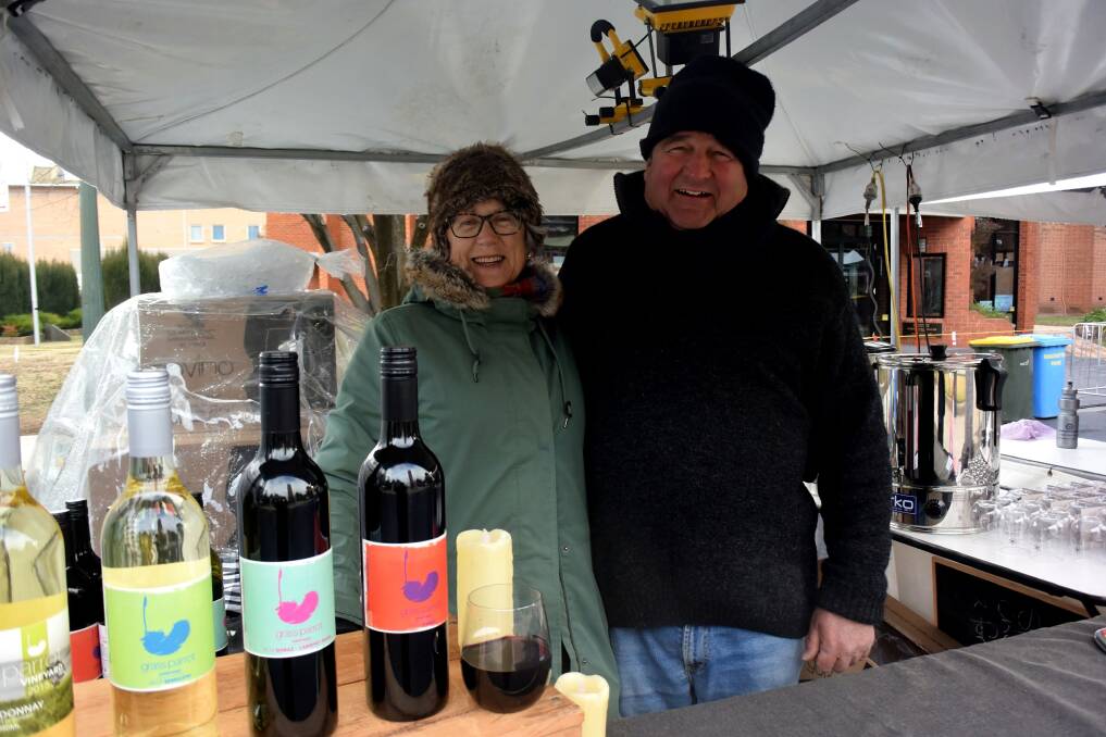 GREAT EVENT: Grass Parrot Vineyard owners Sarah and Andrew Macarthur standing at their stall in Edible Alley on Saturday. Photo: RACHEL CHAMBERLAIN