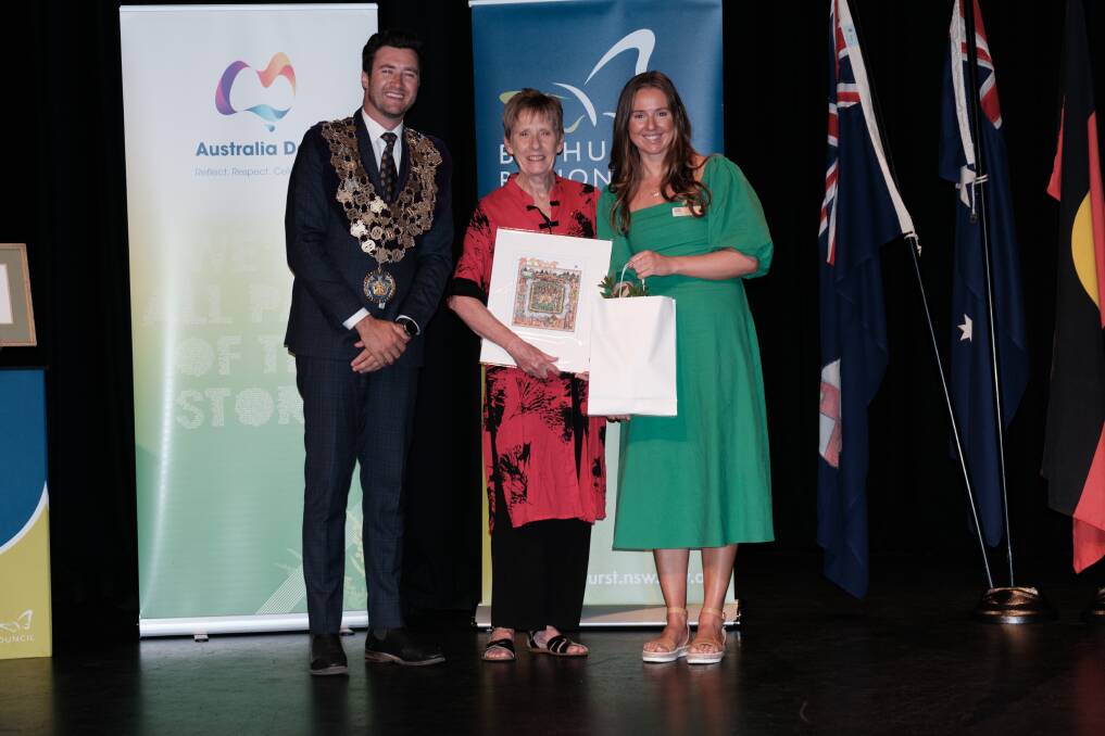 Janet Page OAM (centre) with deputy mayor Ben Fry and Australia Day ambassador Lottie Dalziel. Picture by James Arrow