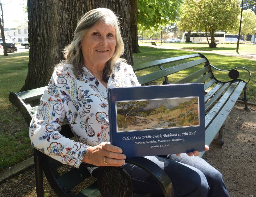 READY TO LAUNCH: Author Sharon Shelton with her new book about the Bridle Track. Photo: RACHEL CHAMBERLAIN