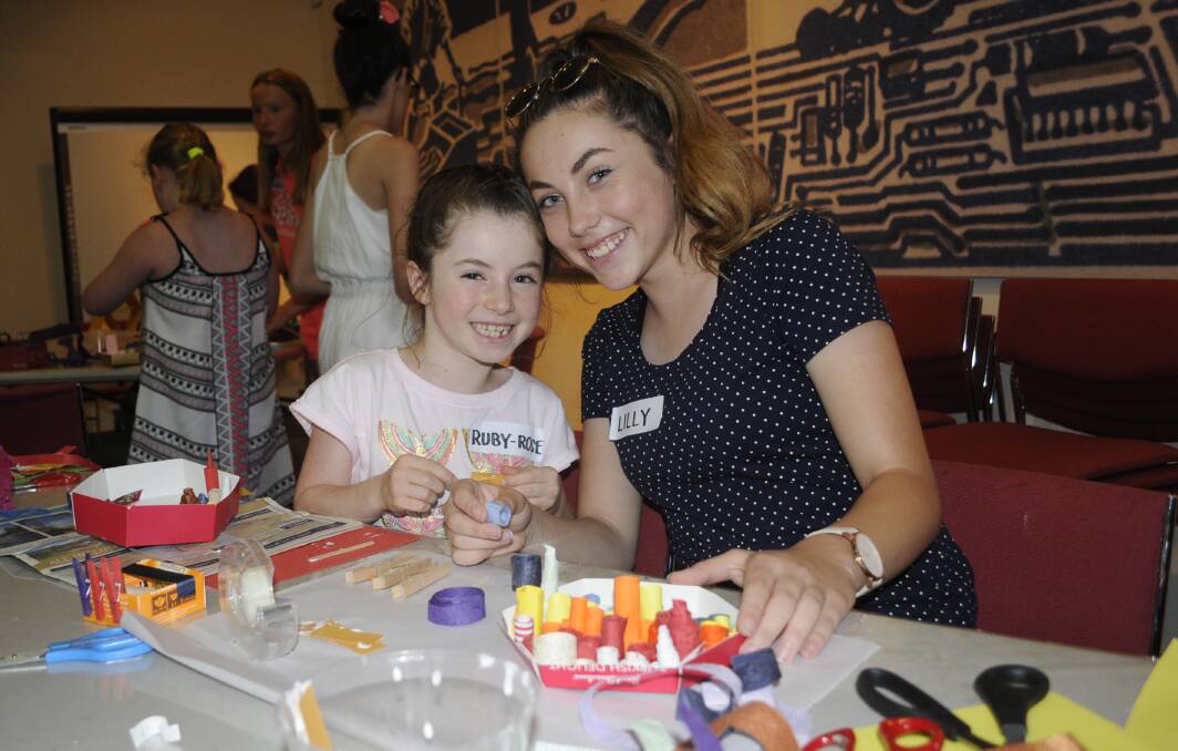 ALL GOOD FUN: Sisters Ruby-Rose and Lilly Hamilton enjoyed themselves at one of Bathurst Regional Art Gallery's summer school holiday workshops last year. Photo: CHRIS SEABROOK 011917cbrag1