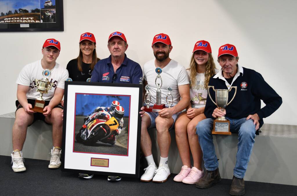 PHOTOS: Andrew 'AJ' Johnson's family donates trophies