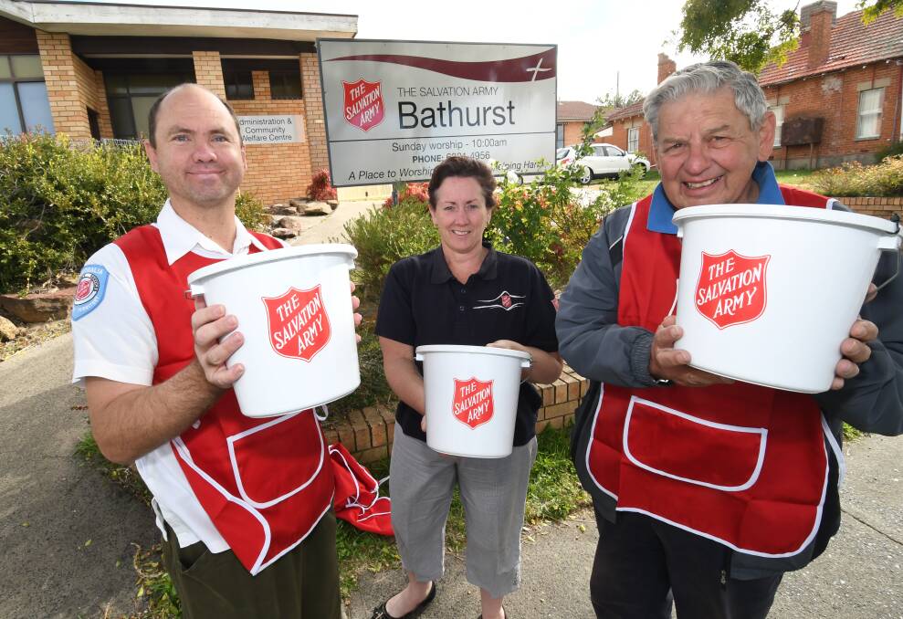 READY TO GO: The Salvation Army's Matt Robinson, Penny Williams and Kevin Howard ahead of the Red Shield Appeal this weekend. Photo: CHRIS SEABROOK 052218csalvos1