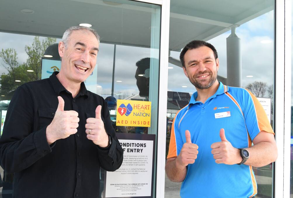 Greg Page at the Manning Aquatic Centre with the manager, Oliver Barclay, where he was promoting the Heart of the Nation campaign. Picture by Rachel Chamberlain