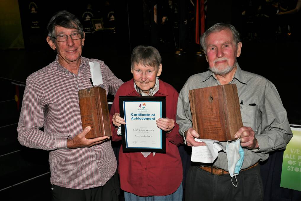 WORTHY WINNERS: Hugh Gould presenting the Jo Ross award to Judy and Geoff Windsor from Wattle Flat. Photo: CHRIS SEABROOK 012622caustday2