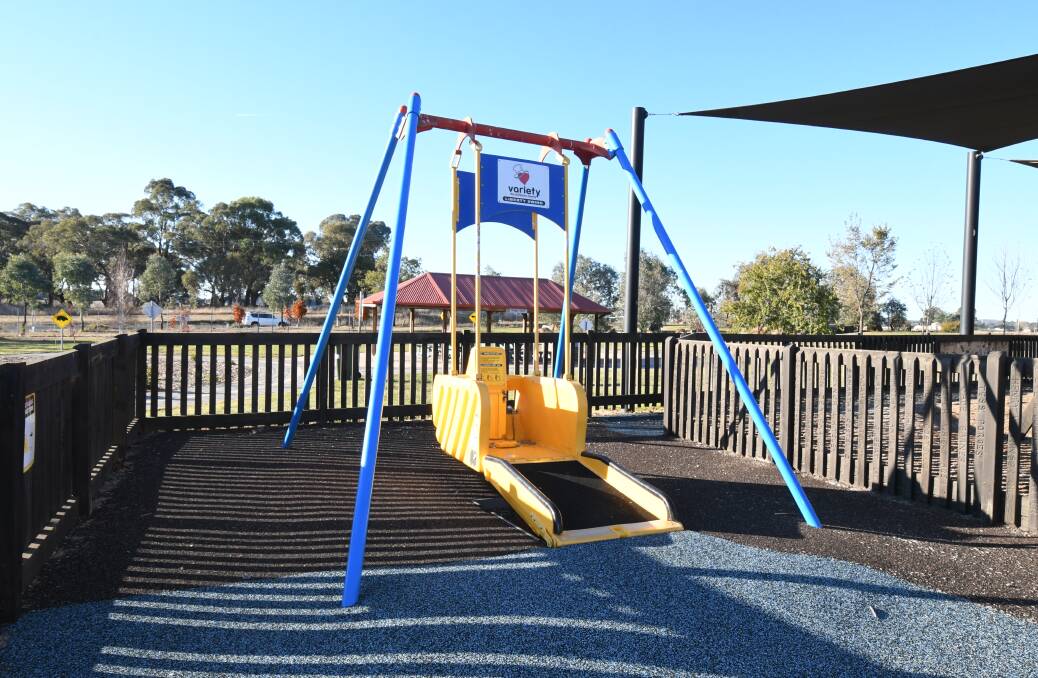 EXAMPLE: This Liberty Swing is located in an Orange park. Something similar was gifted to Bathurst by Variety. Photo: JUDE KEOGH 0518jkswing1