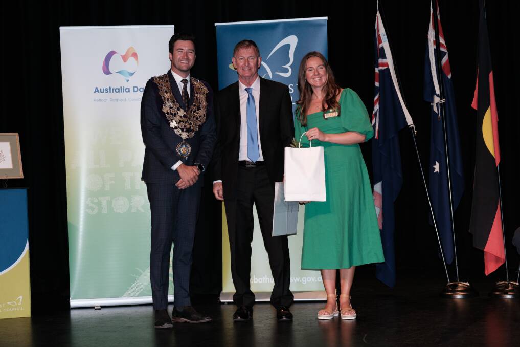 Warren Hickey (centre) with deputy mayor Ben Fry and Australia Day ambassador Lottie Dalziel. Picture by James Arrow