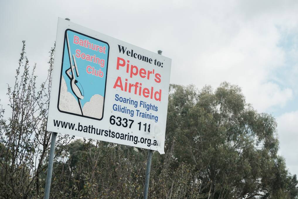 A sign at the entry to Piper's Airfield, where the Bathurst Soaring Club is located. Picture by James Arrow