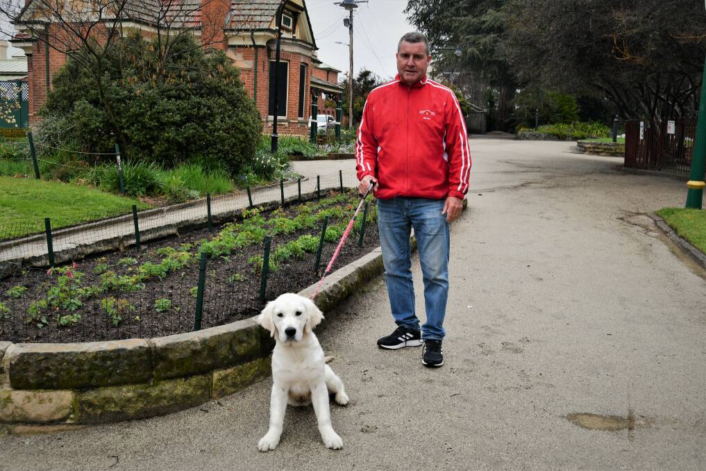 Councillor Warren Aubin in Machattie Park with one of his dogs, Luna. Picture by Rachel Chamberlain